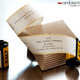 Illustration for article titled Tug the Film Out of Its Canister to Reveal the Wedding Invitation
